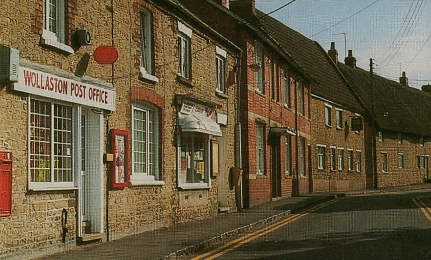 Wollaston Post Office in the 1980s, showing the brick frontage, red postbox and WOLLASTON POST OFFICE sign